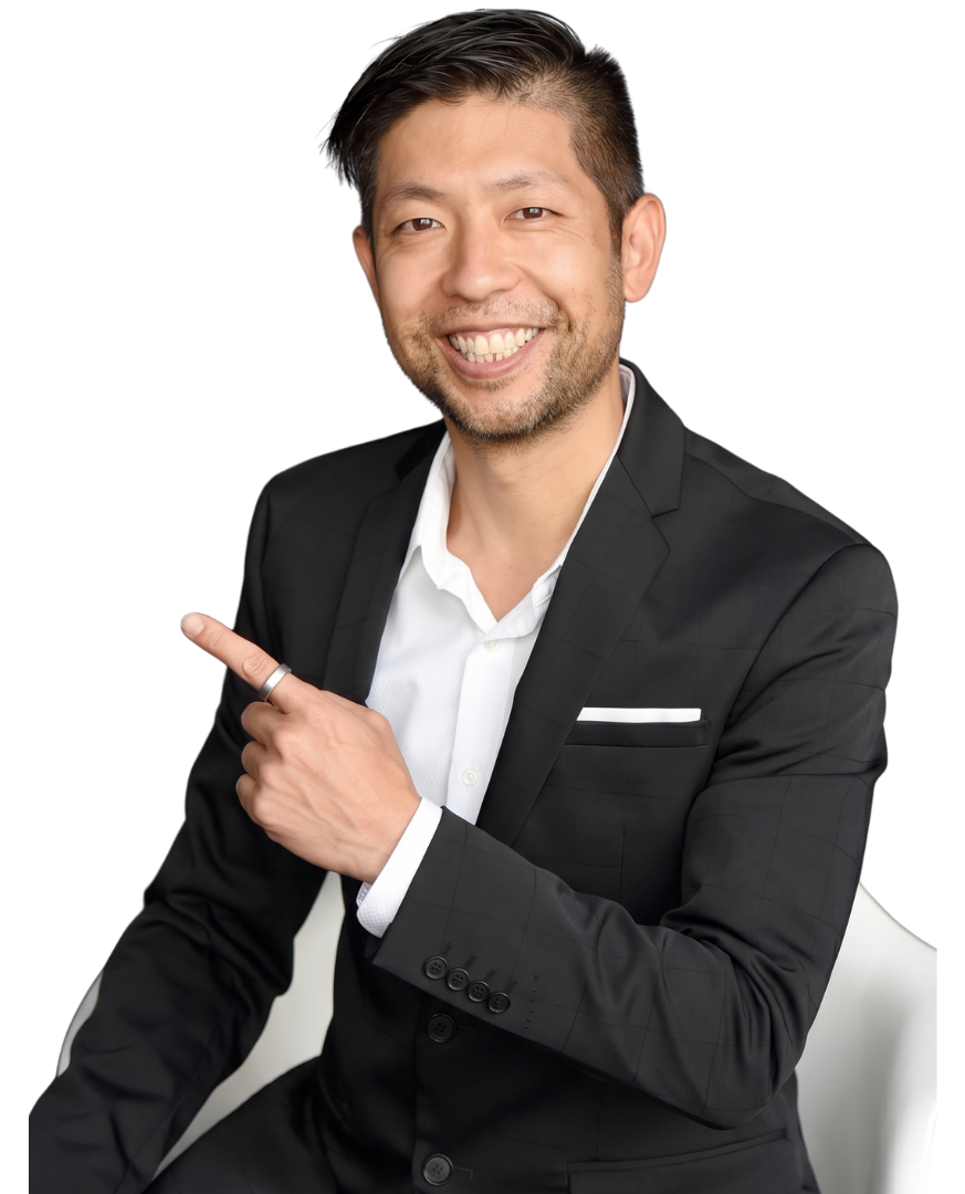 Kirby Chan, Broker, smiling and pointing toward the headline